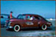 J & J Muffler Shop car